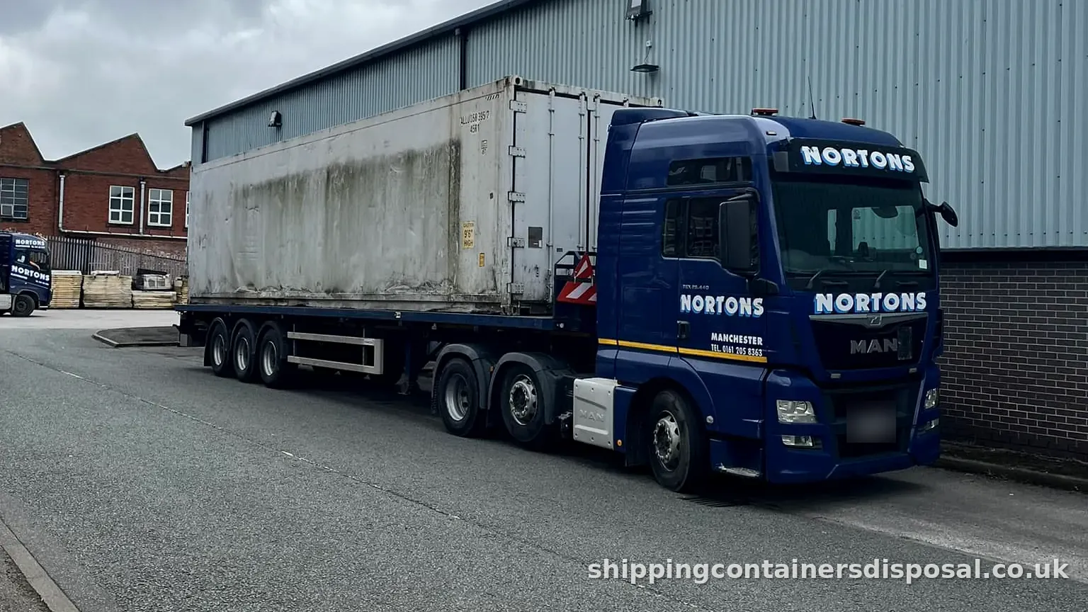 Our articulated lorry with a used 40ft container loaded on the trailer Our articulated lorry with a used 40ft container loaded on the trailer