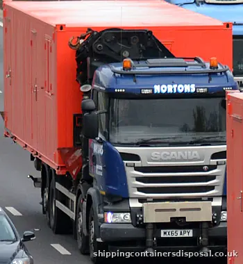 Scania HIAB lorry carrying a red unit Scania HIAB lorry carrying a red unit